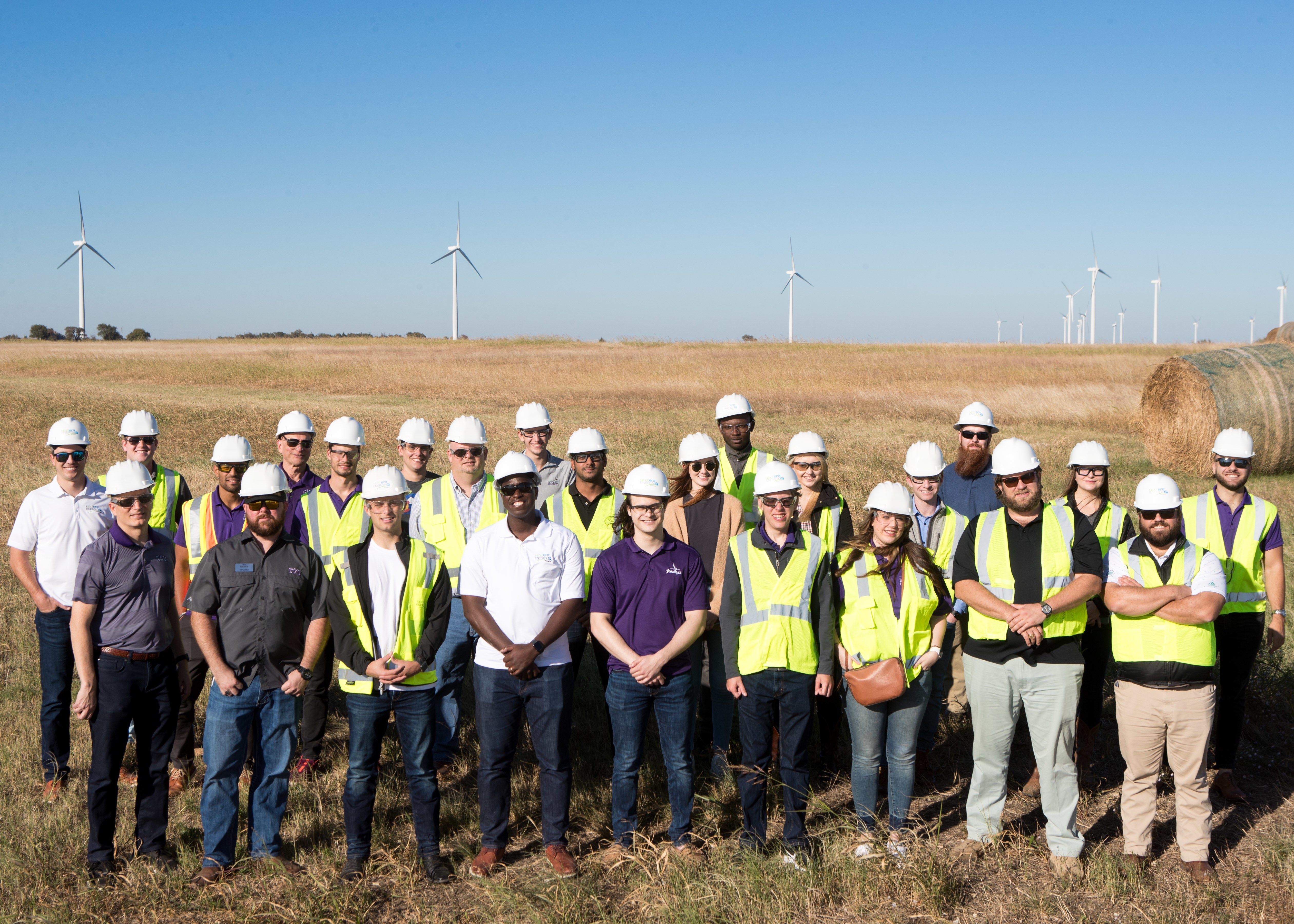 students visiting a wind farm