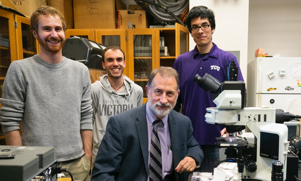 faculty with students doing research