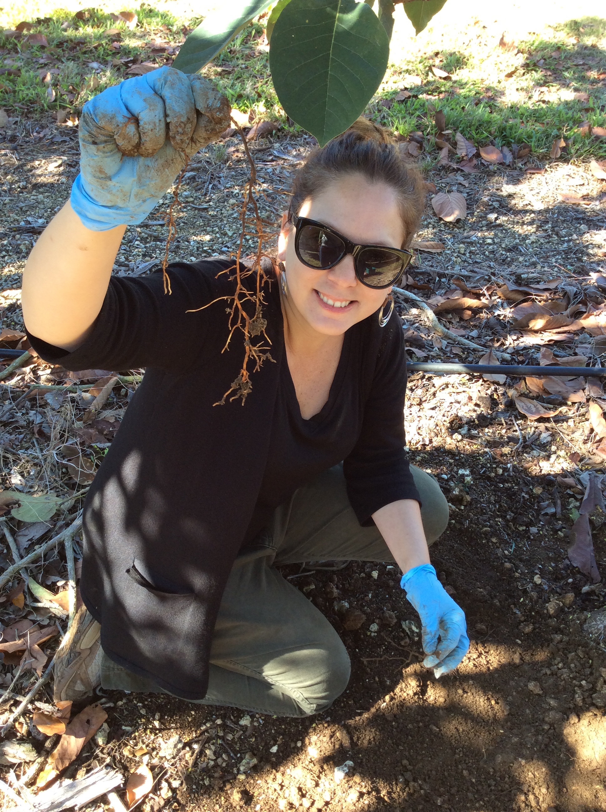 photo of Romina working with plants