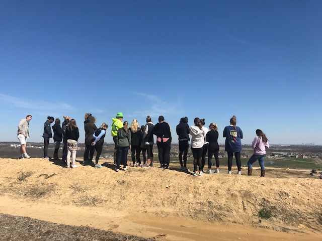 NTDT students overlook a landfill.