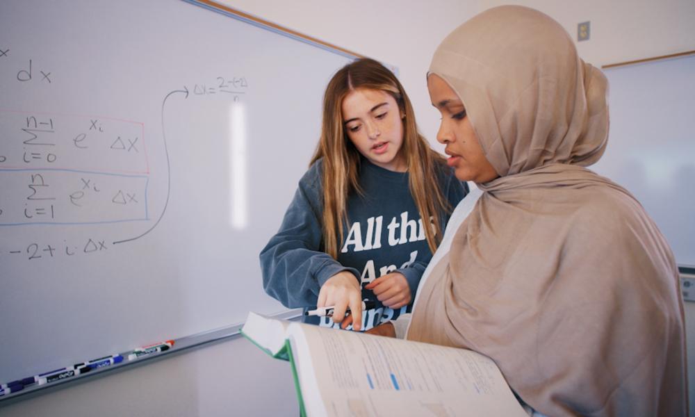 Students helping eachother with Math